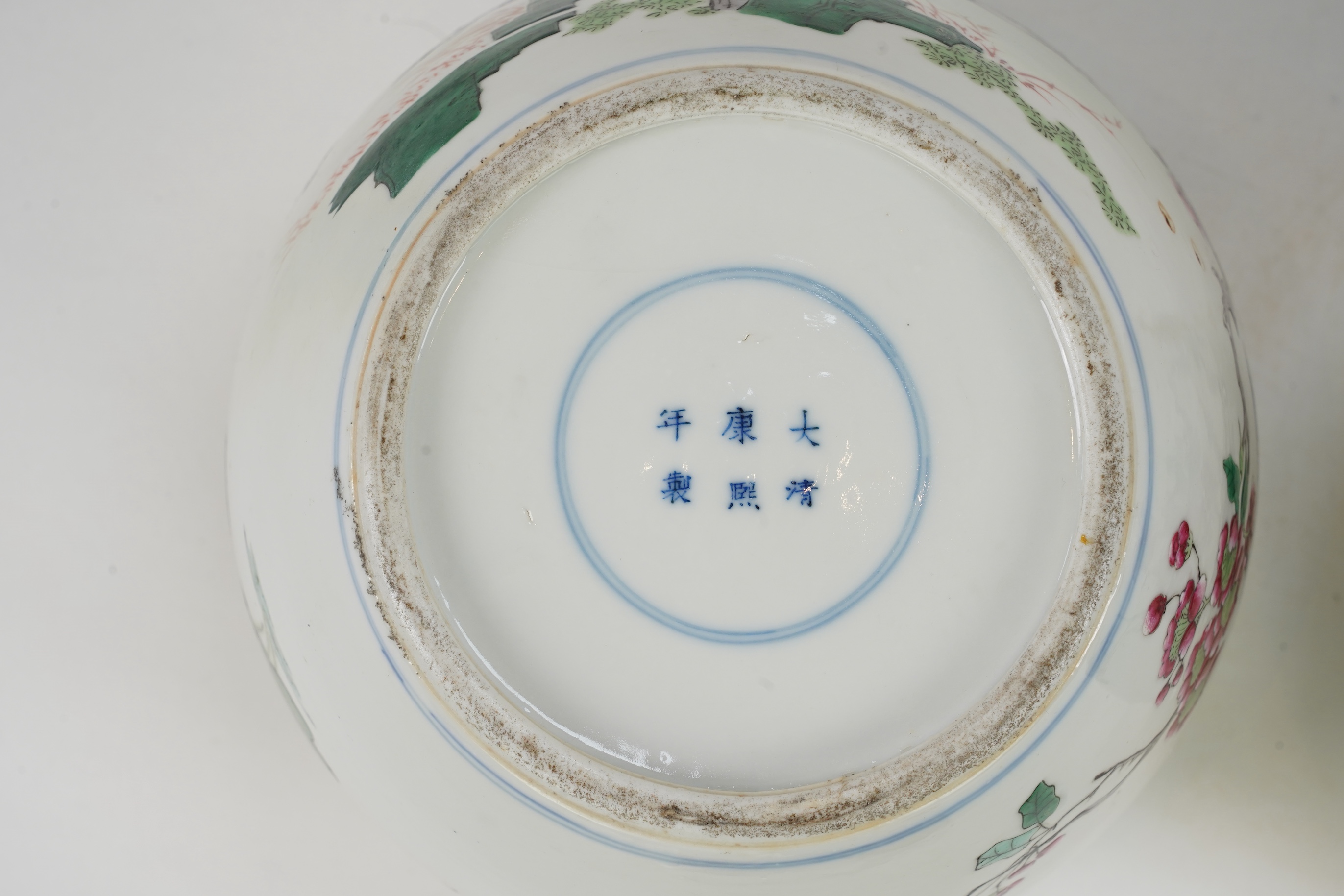 A pair of Chinese famille rose jars and covers, Kangxi mark but late 19th/early 20th century